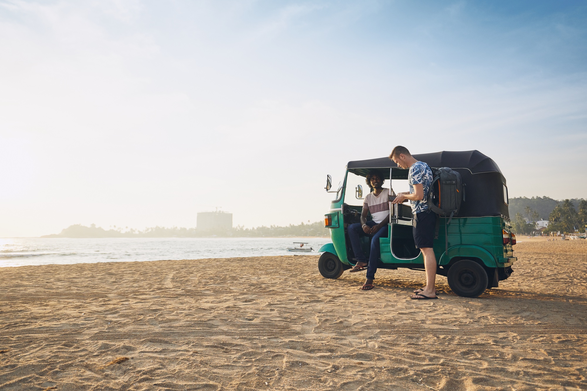 Traveling by tuk tuk taxi